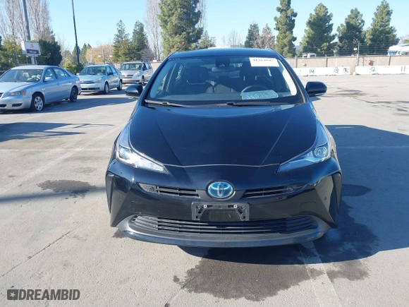 2021 Toyota Prius L Eco with VIN JTDKAMFU0M3133871, listed as a IAAI auction lot 41364847 with 66,102 mi miles. Bid and sale history available at carsss.com. Image 13.