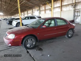 2000 Mercury Sable LS Premium with VIN 1MEFM55S1YG640497, listed as a Copart auction lot 83668544 with 188,490 mi miles and Salvage Title. Bid and sale history available at carsss.com. Image 1.