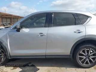 2018 Mazda CX-5 Grand Touring with VIN JM3KFADM6J0325626, listed as a IAAI auction lot 42054702 with 121,952 mi miles and . Bid and sale history available at DreamBid. Image 13.