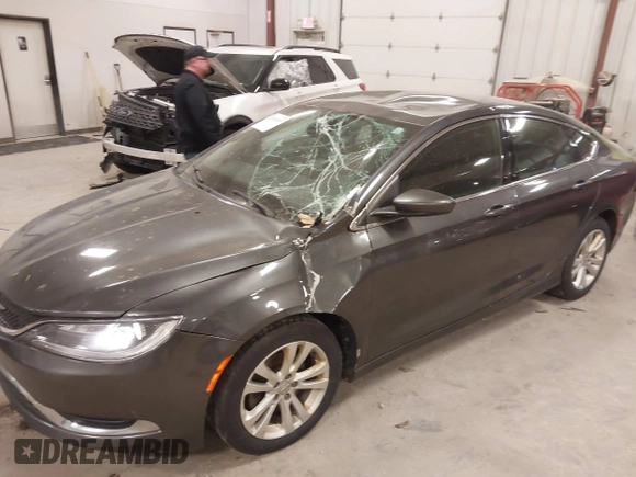 2015 Chrysler 200 Limited with VIN 1C3CCCAB8FN623999, listed as a IAAI auction lot 42040995 with 187,314 mi miles and . Bid and sale history available at DreamBid. Image 6.