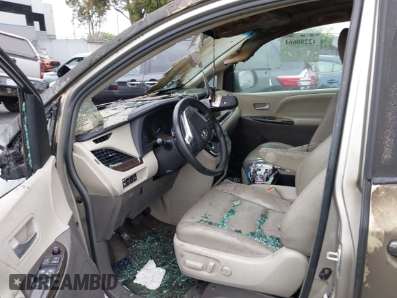 2015 Toyota Sienna XLE with VIN 5TDYK3DC5FS545345, listed as a IAAI auction lot 42280661 with Not provided miles and . Bid and sale history available at DreamBid. Image 13.