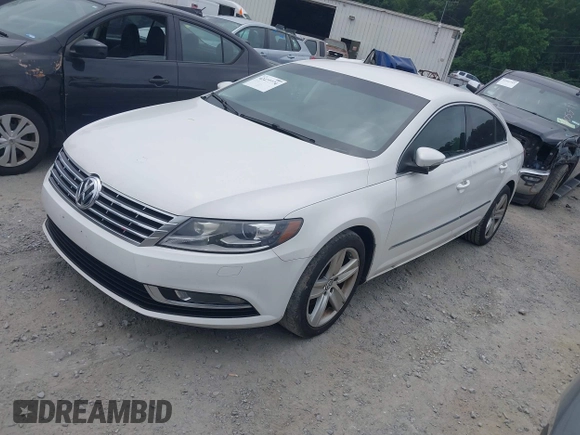 2014 Volkswagen CC R-Line with VIN WVWBP7AN7EE534565, listed as a IAAI auction lot 42477774 with 85,539 mi miles and . Bid and sale history available at DreamBid. Image 2.