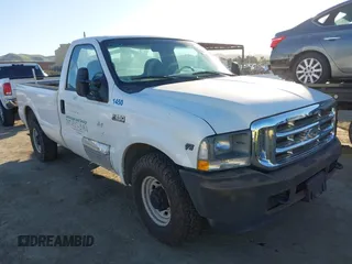 2002 Ford Super Duty F-250 XL with VIN 1FTNF20L72EB79640, listed as a IAAI auction lot 41667865 with 153,384 mi miles. Bid and sale history available at carsss.com. Image 1.