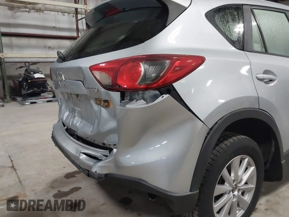 2016 Mazda CX-5 Sport with VIN JM3KE2BY2G0718434, listed as a IAAI auction lot 41961364 with 145,748 mi miles. Bid and sale history available at carsss.com. Image 6.