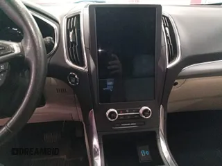 2021 Ford Edge Titanium with VIN 2FMPK4K95MBA50355, listed as a IAAI auction lot 42821253 with 109,191 mi miles and . Bid and sale history available at DreamBid. Image 10.