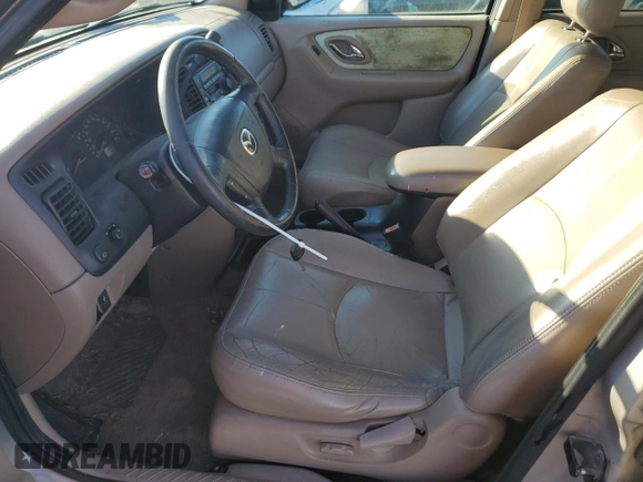 2002 Mazda Tribute LX with VIN 4F2YU09182KM36685, listed as a Copart auction lot 79732664 with 204,262 mi miles and Salvage Title. Bid and sale history available at carsss.com. Image 7.
