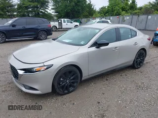 2024 Mazda 3 S Select Sport with VIN 3MZBPABM0RM403431, listed as a IAAI auction lot 42366921 with Not provided miles and . Bid and sale history available at DreamBid. Image 2.