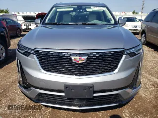 2024 Cadillac XT6 FWD Premium Luxury with VIN 1GYKPCRS7RZ736818, listed as a Copart auction lot 67768804 with 7,145 mi miles and Salvage Title. Bid and sale history available at carsss.com. Image 5.