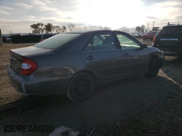 2004 Toyota Camry LE with VIN 4T1BE32K54U811927, listed as a Copart auction lot 80942704 with 197,990 mi miles and Clean title. Bid and sale history available at DreamBid. Image 3.