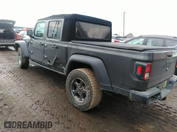 2021 Jeep Gladiator Sport S z VIN 1C6HJTAG3ML597041, wystawiony jako IAAI lot #41714640 z przebiegiem 46 402 mil mil oraz . Historia ofert i sprzedaży dostępna na DreamBid. Obrazek 3.