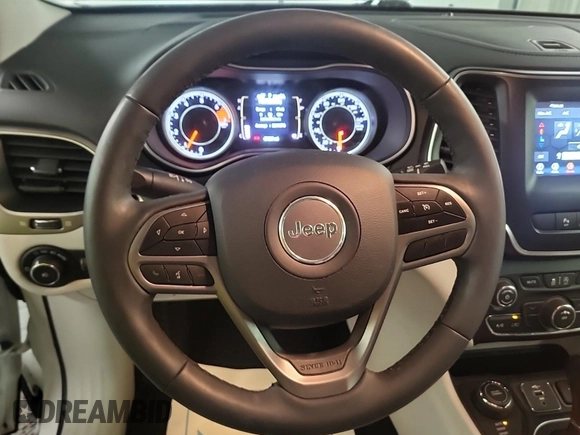 2021 Jeep Cherokee Altitude with VIN 1C4PJMLB9MD211826, listed as a IAAI auction lot 42666661 with 47,838 mi miles and . Bid and sale history available at DreamBid. Image 13.