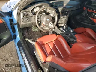 2017 BMW M4 with VIN WBS3U9C31HP971127, listed as a Copart auction lot 74494894 with 65,387 mi miles and Salvage title. Bid and sale history available at DreamBid. Image 8.