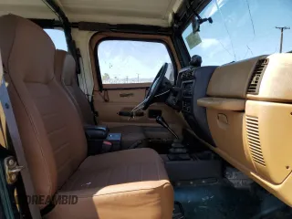 1997 Jeep Wrangler SE with VIN 1J4FY29P3VP492935, listed as a Copart auction lot 67607644 with 129,227 mi miles and Salvage Title. Bid and sale history available at carsss.com. Image 7.