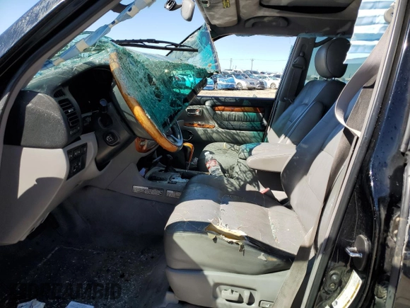 2004 Lexus LX 470 with VIN JTJHT00W043536558, listed as a Copart auction lot 48498305 with Not Provided miles and Salvage Title. Bid and sale history available at DreamBid. Image 7.