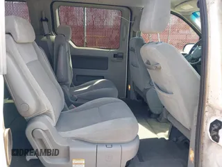 2006 Ford Freestar SEL z VIN 2FMZA52296BA23814, wystawiony jako IAAI lot #41791434 z przebiegiem 132 850 mil mil oraz . Historia ofert i sprzedaży dostępna na DreamBid. Obrazek 8.