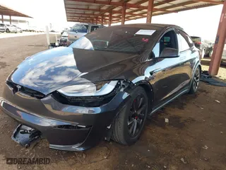 2024 Tesla Model X Plaid with VIN 7SAXCBE60RF447105, listed as a IAAI auction lot 41355592 with NaN miles. Bid and sale history available at carsss.com. Image 18.