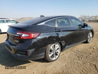 2018 Honda Clarity Touring with VIN JHMZC5F39JC019173, listed as a Copart auction lot 66970772 with 28,674 mi miles. Bid and sale history available at carsss.com. Image 4.