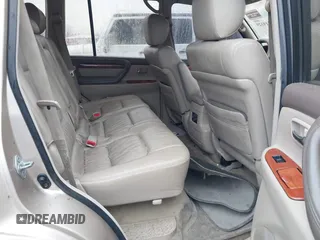 1999 Lexus LX 470 z VIN JT6HT00W4X0056023, wystawiony jako IAAI lot #41319329 z przebiegiem 206 974 mil mil oraz . Historia ofert i sprzedaży dostępna na DreamBid. Obrazek 8.