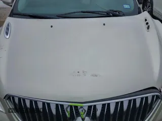 2014 Buick Enclave Premium with VIN 5GAKRCKD8EJ288451, listed as a IAAI auction lot 41323941 with 215,111 mi miles. Bid and sale history available at carsss.com. Image 10.