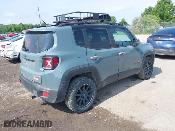 2016 Jeep Renegade Trailhawk with VIN ZACCJBCTXGPD99550, listed as a IAAI auction lot 42446773 with 174,283 mi miles and . Bid and sale history available at DreamBid. Image 4.