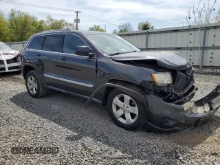 2011 Jeep Grand Cherokee Laredo z VIN 1J4RR4GG8BC738468, wystawiony jako Copart lot #54907215 z przebiegiem 182 576 mil mil oraz Szkoda całkowita • Salvage title. Historia ofert i sprzedaży dostępna na DreamBid. Obrazek 4.