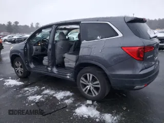 2017 Honda Pilot EX-L with VIN 5FNYF6H54HB008054, listed as a Copart auction lot 82758704 with 124,024 mi miles and Salvage Title. Bid and sale history available at DreamBid. Image 2.