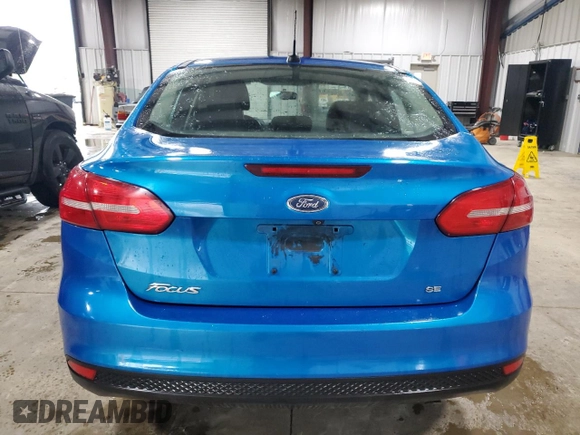 2016 Ford Focus SE z VIN 1FADP3F25GL208056, wystawiony jako Copart lot #57846215 z przebiegiem 127 239 mil mil oraz Szkoda całkowita • Salvage title. Historia ofert i sprzedaży dostępna na DreamBid. Obrazek 6.
