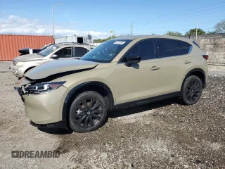 2024 Mazda CX-5 2.5 Carbon Turbo with VIN JM3KFBAYXR0521660, listed as a Copart auction lot 42415895 with 4,857 mi miles and Clean Title. Bid and sale history available at carsss.com. Image 1.