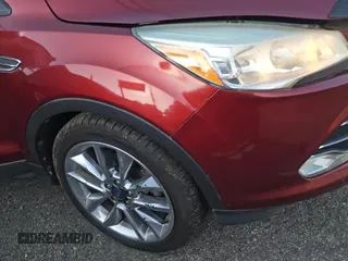 2015 Ford Escape SE z VIN 1FMCU0G93FUA00593, wystawiony jako Copart lot #80994805 z przebiegiem 190 438 mil mil oraz Czysty tytuł • Clean title. Historia ofert i sprzedaży dostępna na DreamBid. Obrazek 11.