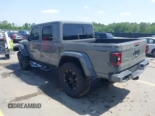 2022 Jeep Gladiator High Altitude with VIN 1C6HJTFG5NL149751, listed as a IAAI auction lot 42257917 with 24,603 mi miles and . Bid and sale history available at DreamBid. Image 3.