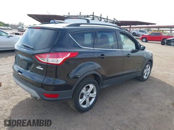 2016 Ford Escape SE with VIN 1FMCU0GX4GUC56208, listed as a IAAI auction lot 42173482 with 124,325 mi miles and . Bid and sale history available at carsss.com. Image 4.