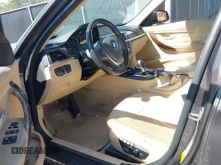 2014 BMW 3 Series 328i with VIN WBA3A5G57ENP28138, listed as a IAAI auction lot 41760371 with 147,897 mi miles and . Bid and sale history available at DreamBid. Image 5.