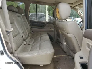 1999 Toyota Land Cruiser z VIN JT3HT05J5X0050404, wystawiony jako Copart lot #56066125 z przebiegiem 385 659 mil mil oraz Tytuł czysty. Historia ofert i sprzedaży dostępna na DreamBid. Obrazek 11.