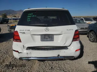 2014 Mercedes-Benz GLK 250 with VIN WDCGG0EB7EG288855, listed as a Copart auction lot 71674894 with 64,317 mi miles and Salvage Title. Bid and sale history available at DreamBid. Image 6.