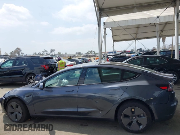 2023 Tesla Model 3 with VIN 5YJ3E1EA0PF518904, listed as a IAAI auction lot 42058540 with 20,945 mi miles and . Bid and sale history available at DreamBid. Image 13.