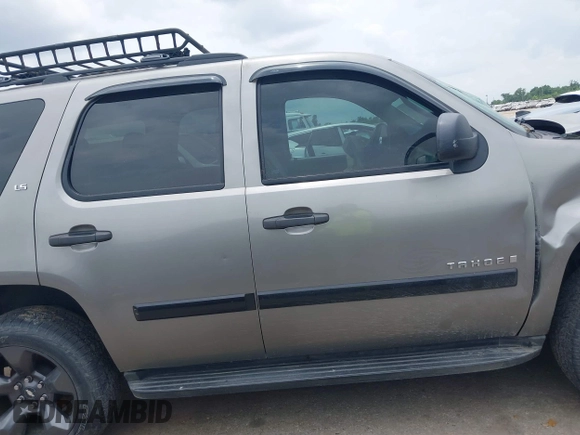2007 Chevrolet Tahoe LS with VIN 1GNFC13C57R279441, listed as a IAAI auction lot 42428981 with 229,827 mi miles and . Bid and sale history available at DreamBid. Image 14.