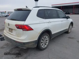 2020 Volkswagen Tiguan S with VIN 3VV1B7AX5LM079123, listed as a IAAI auction lot 41957273 with 89,449 mi miles and . Bid and sale history available at DreamBid. Image 4.