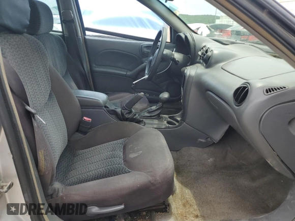 2004 Pontiac Grand Am SE1 with VIN 1G2NF52E74M687538, listed as a Copart auction lot 60922655 with 139,795 mi miles and Salvage title. Bid and sale history available at DreamBid. Image 7.