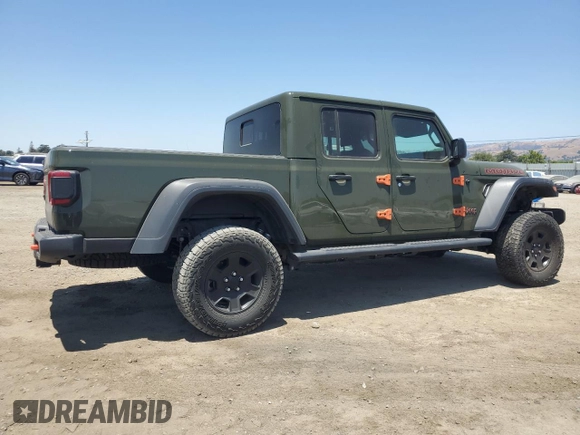 2023 Jeep Gladiator Mojave with VIN 1C6JJTEG9PL559331, listed as a Copart auction lot 62415345 with 22,091 mi miles and Salvage title. Bid and sale history available at DreamBid. Image 3.