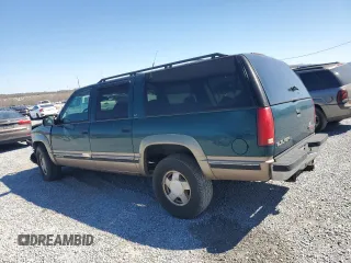 1997 GMC Suburban z VIN 1GKFK16R0VJ749323, wystawiony jako Copart lot #50222125 z przebiegiem 209 355 mil mil oraz Szkody całkowita. Historia ofert i sprzedaży dostępna na DreamBid. Obrazek 2.