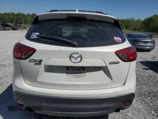 2016 Mazda CX-5 Grand Touring with VIN JM3KE4DY0G0819528, listed as a Copart auction lot 52343885 with 77,340 mi miles and Clean Title. Bid and sale history available at DreamBid. Image 6.