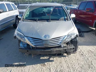 2015 Toyota Sienna XLE with VIN 5TDYK3DC0FS632909, listed as a IAAI auction lot 42012143 with 97,084 mi miles and . Bid and sale history available at DreamBid. Image 13.