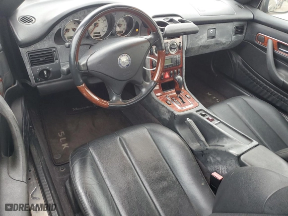 2002 Mercedes-Benz SLK-Class 3.2L with VIN WDBKK65F12F250431, listed as a Copart auction lot 86139214 with 72,356 mi miles and Clean Title. Bid and sale history available at carsss.com. Image 8.