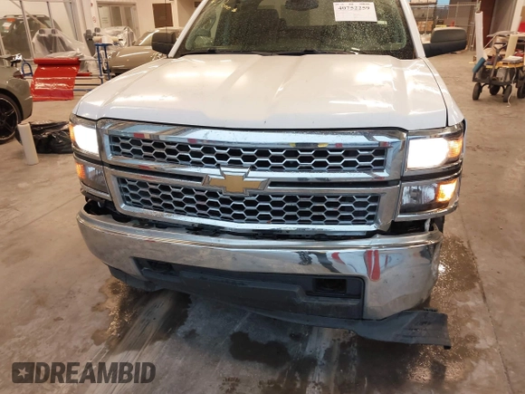 2014 Chevrolet Silverado 1500 LT with VIN 1GCVKREC3EZ106310, listed as a IAAI auction lot 40752259 with 162,397 mi miles and . Bid and sale history available at DreamBid. Image 6.