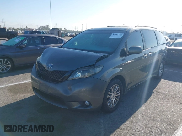 2011 Toyota Sienna XLE AAS with VIN 5TDYK3DC6BS072856, listed as a IAAI auction lot 42684298 with 113,202 mi miles and . Bid and sale history available at DreamBid. Image 2.
