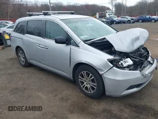 2013 Honda Odyssey EX-L with VIN 5FNRL5H65DB050789, listed as a IAAI auction lot 41911537 with 160,348 mi miles and . Bid and sale history available at carsss.com. Image 1.