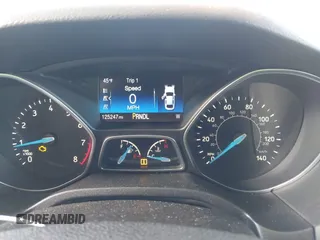 2016 Ford Focus SE with VIN 1FADP3F28GL330815, listed as a IAAI auction lot 41696821 with 125,247 mi miles. Bid and sale history available at carsss.com. Image 7.