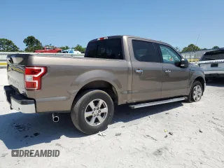 2018 Ford F-150 XL with VIN 1FTEW1CG4JKC38569, listed as a Copart auction lot 54779805 with 97,190 mi miles and Salvage Title. Bid and sale history available at carsss.com. Image 3.