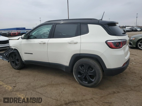 2019 Jeep Compass Altitude with VIN 3C4NJCBB4KT618673, listed as a Copart auction lot 51801955 with 104,784 mi miles and Salvage title. Bid and sale history available at DreamBid. Image 2.