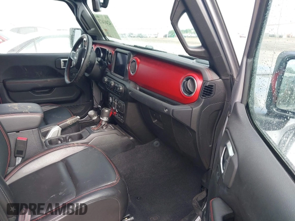 2020 Jeep Gladiator Rubicon z VIN 1C6JJTBG7LL181833, wystawiony jako IAAI lot #42493073 z przebiegiem 13 775 mil mil oraz . Historia ofert i sprzedaży dostępna na DreamBid. Obrazek 5.